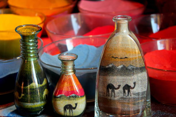 istock Arabian style souvenirs with multicolored sand in bottles, Dubai, UAR 1366011838