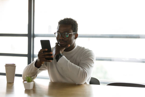 istock Businessman on a coffee break scrolling through social media 1366012301