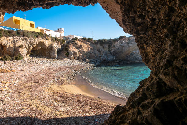 the cave of the sea lion in a cliff of the old island of tabarca, in the spanish mediterranean, in front of santa pola, alicante - island of tabarca imagens e fotografias de stock