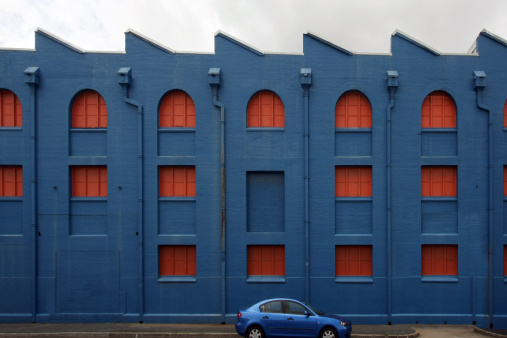 Blue building with blue car