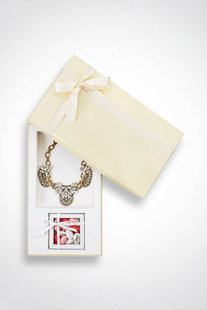 Valentine's day gift , necklace with candies in gift box isolated on white background (with clipping path)