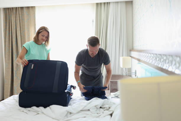 istock A couple in the room are packing things 1366021503
