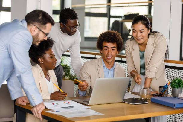 istock Diverse group of business people having a project briefing 1366021532