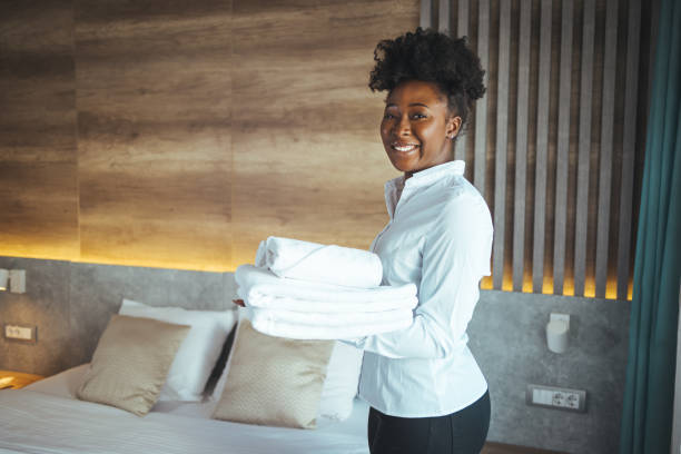 istock Clean towels during housekeeping in a hotel room 1366021774