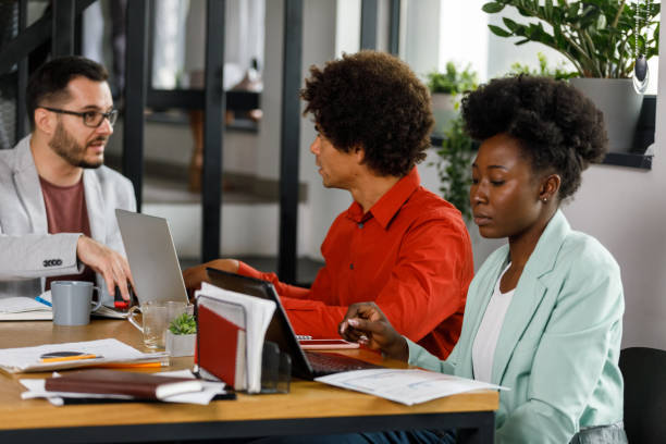 istock Business people planning upcoming projects during a meeting 1366021940