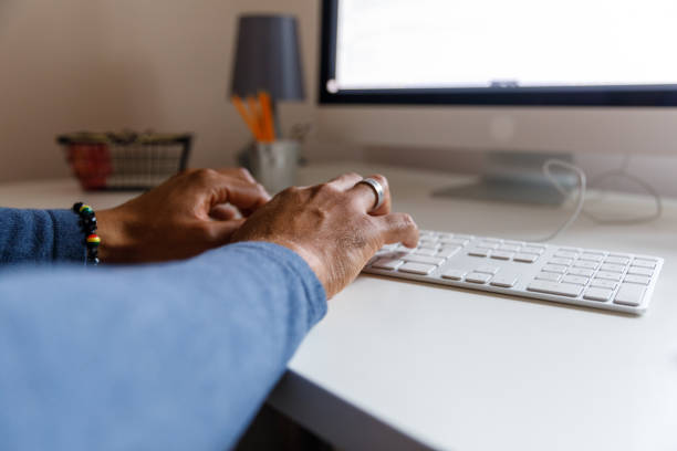 istock Cut out shot of unrecognizable man typing on a computer keyboard 1366023724