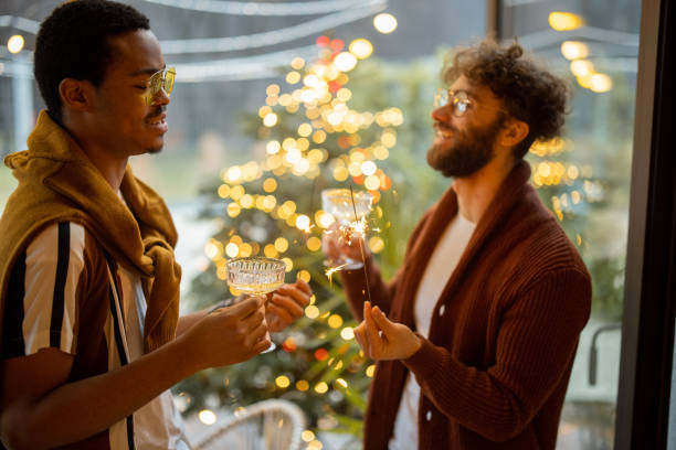 istock Two male friends celebrating with wine at backyard 1366025247