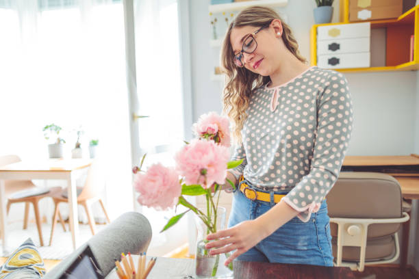istock Young woman at home 1366025350