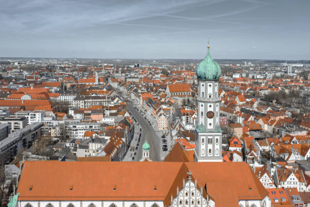 Church, red roofs of houses. City center.