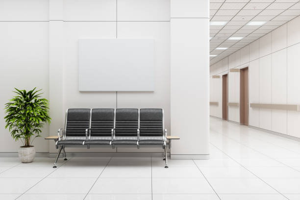 Waiting Room In Hospital Or In Office With Empty Seats And Blank Poster On Wall Waiting Room In Hospital Or In Office With Empty Seats And Blank Poster On Wall medical office lobby stock pictures, royalty-free photos & images