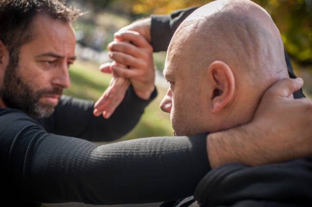 istock Street fighting self defense technique against holds and grabs 1366034762