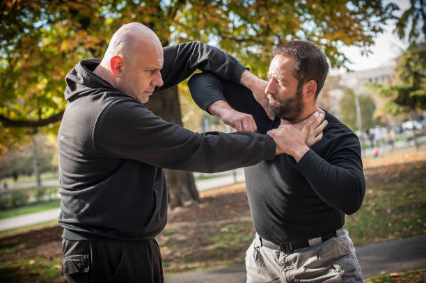 istock Street fighting self defense technique against holds and grabs 1366034781