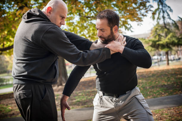 istock Street fighting self defense technique against holds and grabs 1366034794