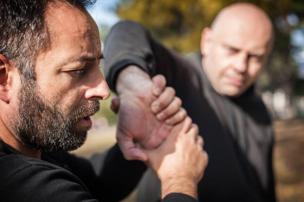 istock Street fighting self defense technique against holds and grabs 1366034820