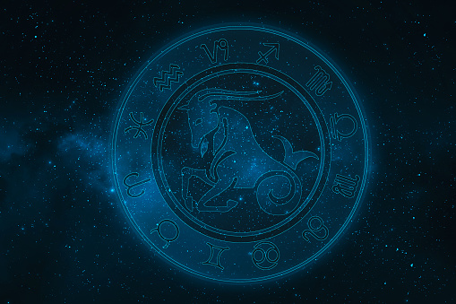 capricorn horoscope sign in twelve zodiac with galaxy stars background