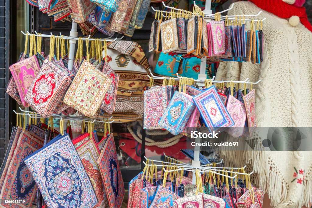 Old Bazaar in Sarajevo Traditional bags and wallets made of decorative fabric at the old bazaar (Bascarsija) in Sarajevo, Bosnia and Herzegovina Bag Stock Photo