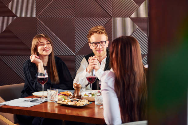 istock Having conversation. Indoors of new modern luxury restaurant 1366039034