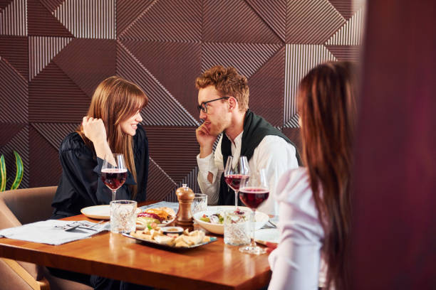 istock Having conversation. Indoors of new modern luxury restaurant 1366039078