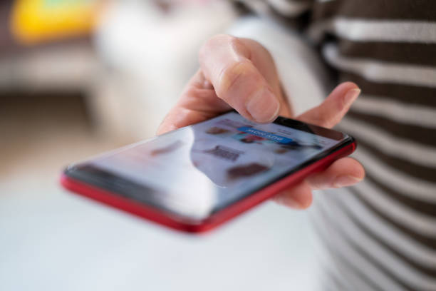 istock Shopping Online With Phone 1366040335
