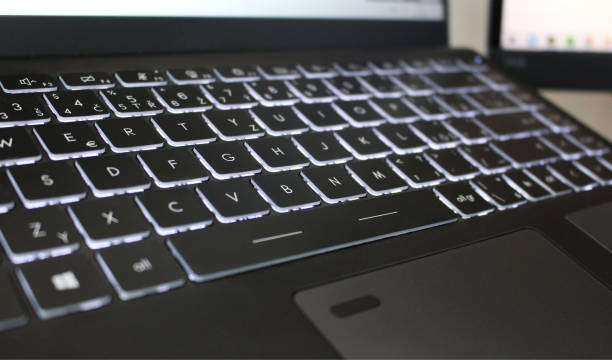 istock Cool black laptop keyboard with backlit buttons 1366040754