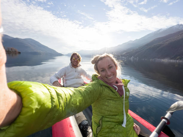 istock Couple taking cool selfie on a canoe trip 1366045328
