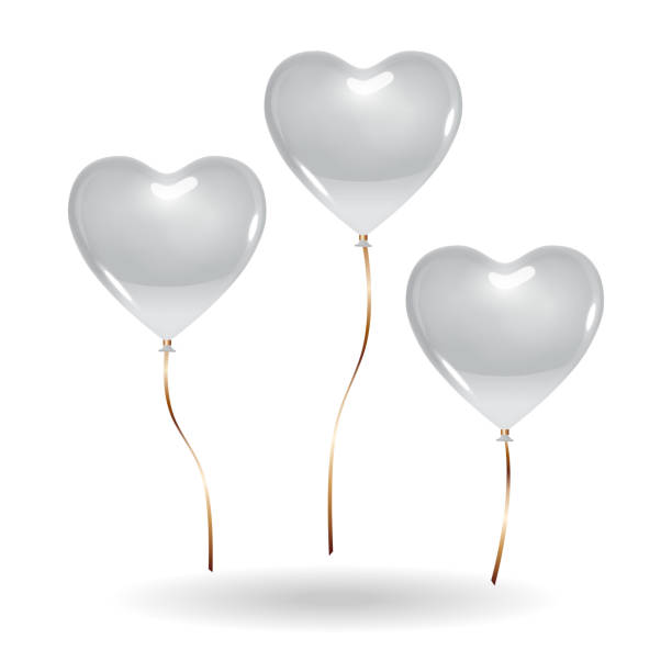 istock 3 heart shaped silver gray color balloons. Isolated on white background with shadow mockup template object. 1366052459