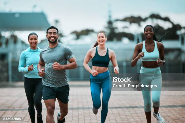 Shot Of A Group Of Friends Hanging Out Before Working Out Together Stock Photo - Download Image Now