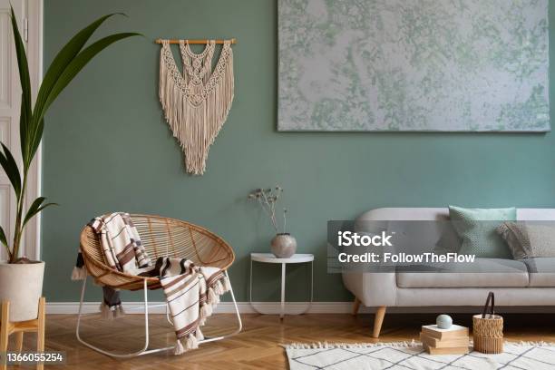 Creative Living Room Interior Design Composition With Crey Scandi Sofa Rattan Armchair Plants Carpet And Beautiful Boho Accessories Eucalyptus Walls And Parquet Floor Stock Photo - Download Image Now