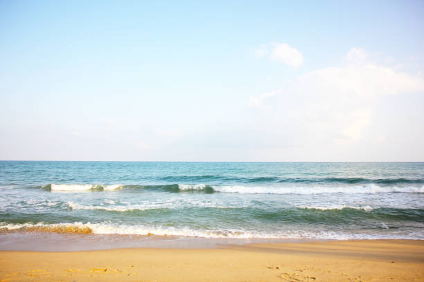 istock blue sea little wave blue sky white cloud nature background 1366055381