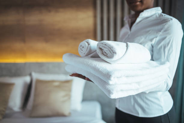 istock Housekeeper cleaning a hotel room. 1366057910