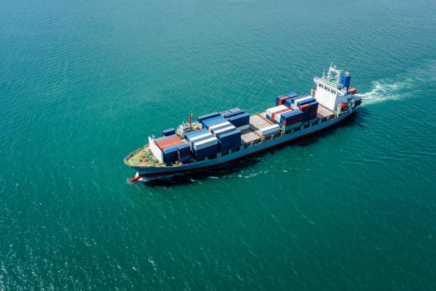 istock angle view in front container ship full speed in green sea, business and industry transportation import export international by container ship open sea horizon and blue sky background 1366058097