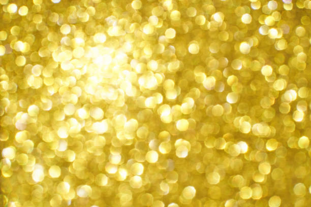 istock Bokeh circle with gold sparkles background. Yellow glitter backdrop. Golden texture 1366061511