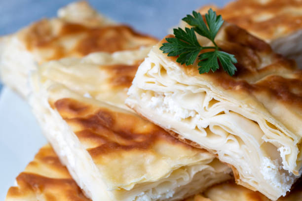 istock Delicious Turkish food; Tray pastry; (Turkish name; Su boregi) 1366063440