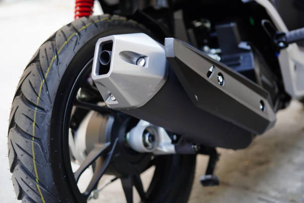 istock motorcycle wheel and exhaust pipe 1366066005