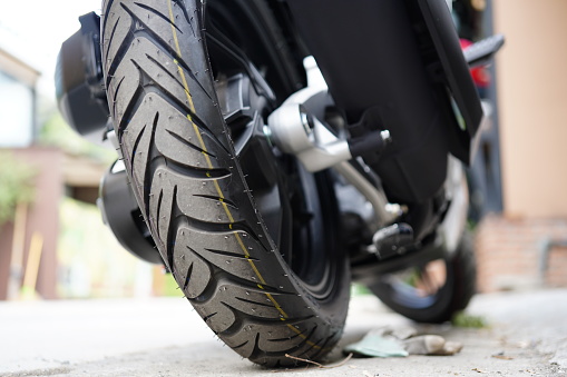 Wheel motorcycle rear tire on road