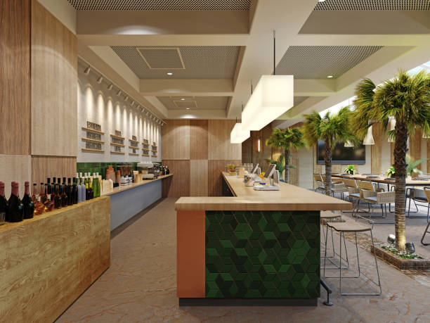 istock Green tiled bar counter with bar stools in a modern restaurant with palm trees. 1366068647