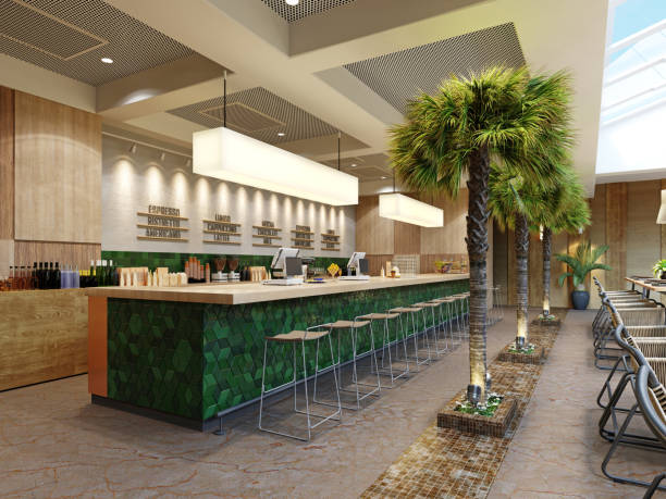 istock Green tiled bar counter with bar stools in a modern restaurant with palm trees. 1366068649