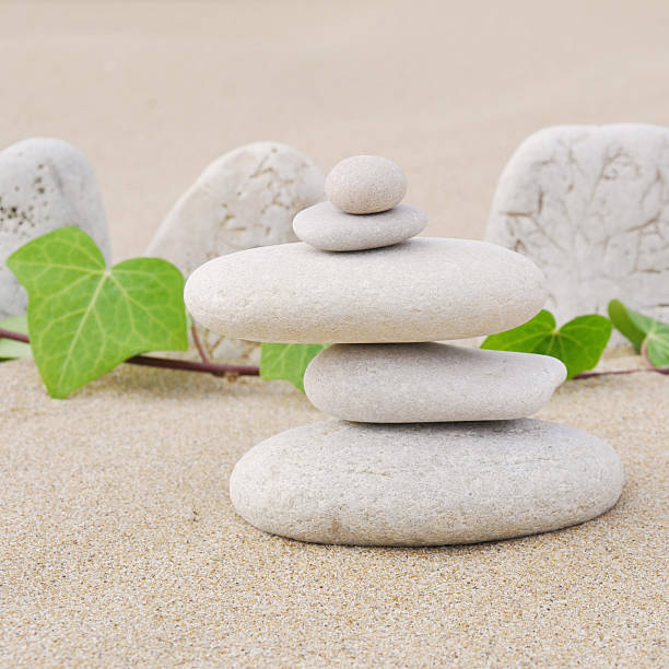 istock Meditation Stones on Sand with Ivy in background 136606870
