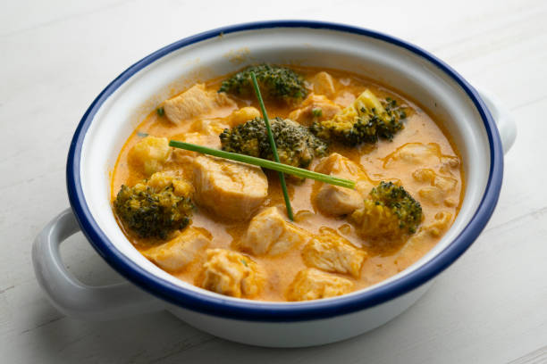 istock Chicken cooked in curry with broccoli and coconut milk. 1366068741