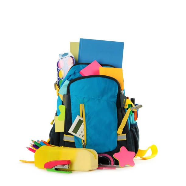 istock Blue backpack with different school stationery on white background 1366069354