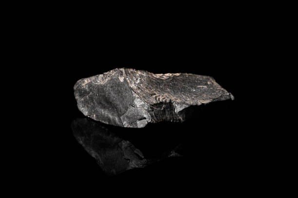 istock Macro Close up image of raw material Manganese Ore rock isolated 1366076821