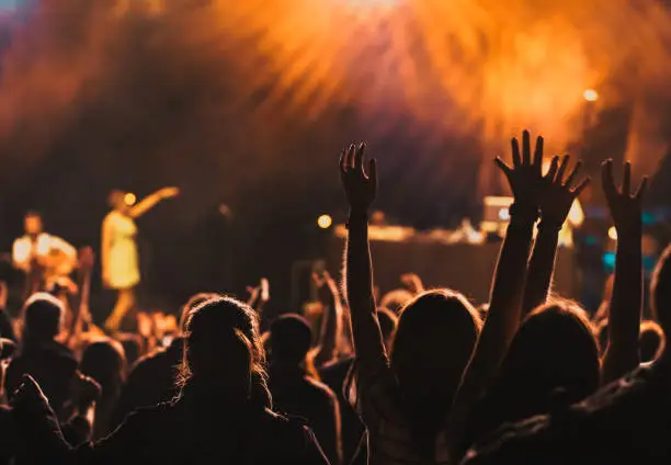 Photo of concert and festival background crowd of people partying