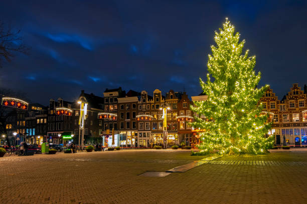 Christmas on the Nieuwmarkt in Amsterdam the Netherlands at night stock photo