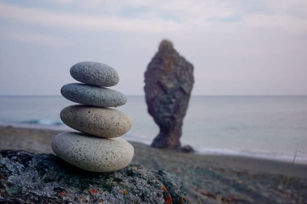 istock Stacked pebbles off the coast of Cape Giant 1366078593