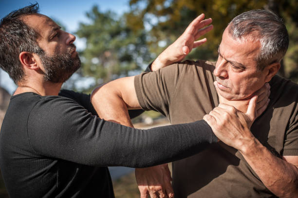 istock Street fighting self defense technique against holds and grabs 1366080601