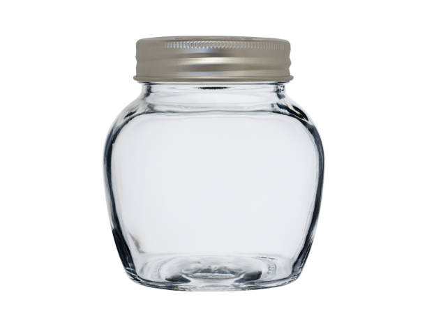 istock Empty glass jar, closed with a metal lid. Isolated on a white background. 1366084597