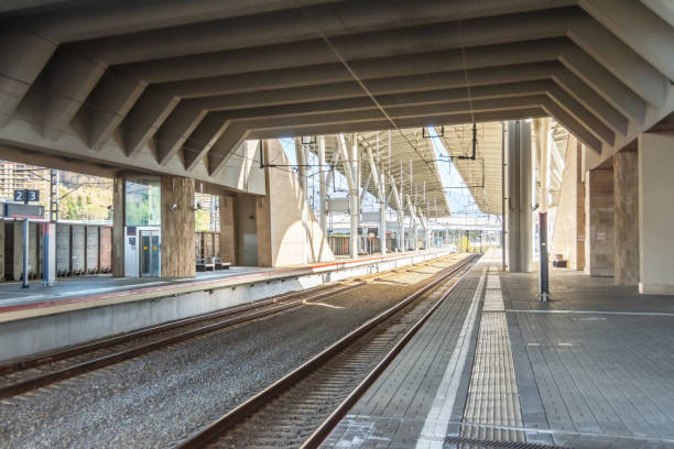istock View of the empty passenger railway platform. 1366091840