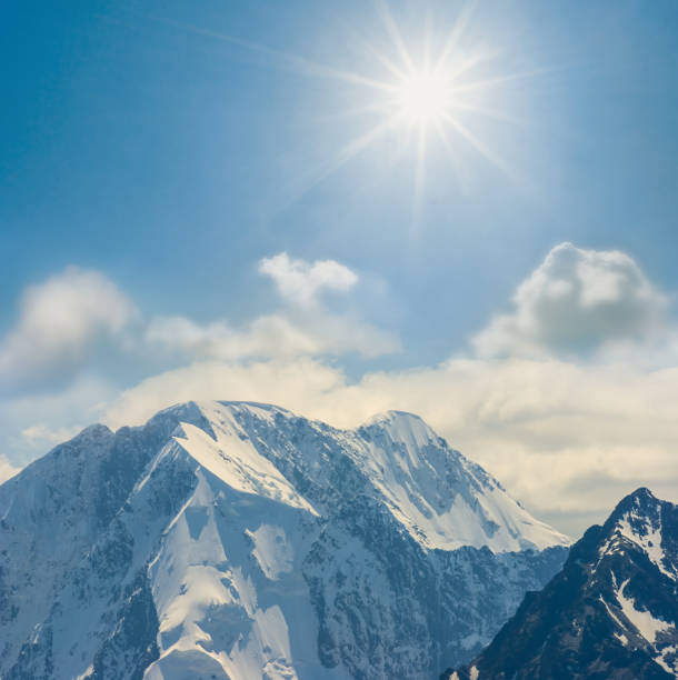 istock mount peak in snow under sparkle sun 1366096173
