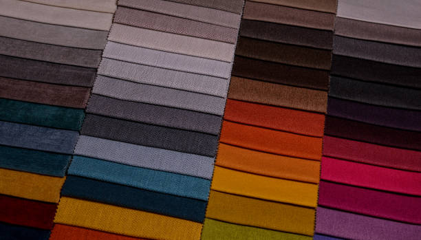 istock Samples of furniture fabrics.Multicolor fabric texture background. 1366099649