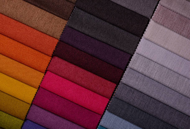 istock Samples of furniture fabrics.Multicolor fabric texture background. 1366100282